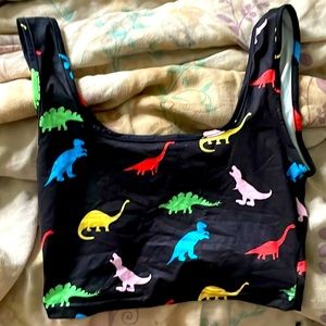 this is a cute crop top from shein with bright colorful dinosaurs on it!